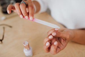 Woman taking care of her nails