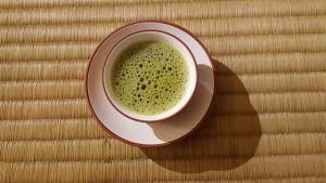 Matcha green tea in a tea cup