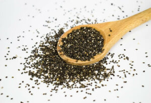 wooden spoon with chia seeds on it